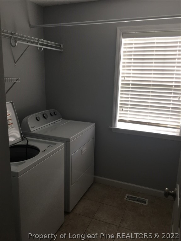 1409 Blue Ribbon Lane Hope Mills, NC 28348 - Photo 11 of 19 a utility room with dryer and washer