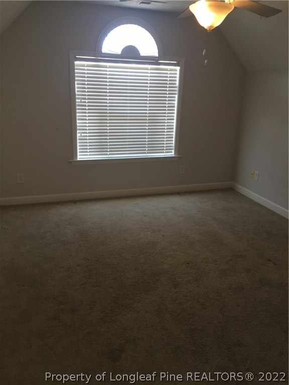 1409 Blue Ribbon Lane Hope Mills, NC 28348 - Photo 13 of 19 an empty room with a window