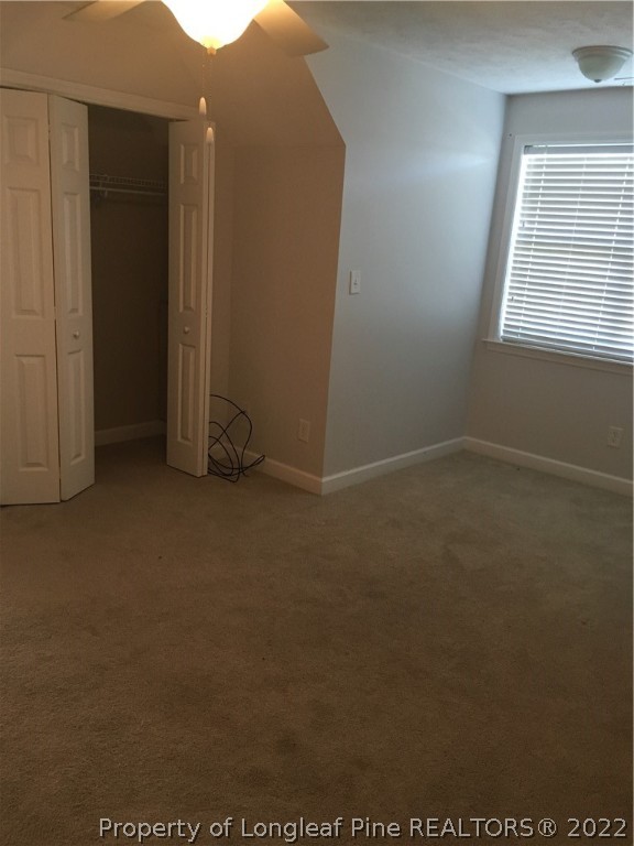 1409 Blue Ribbon Lane Hope Mills, NC 28348 - Photo 14 of 19 an empty room with windows