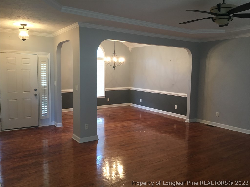 1409 Blue Ribbon Lane Hope Mills, NC 28348 - Photo 2 of 19 a view of a livingroom with wooden floor