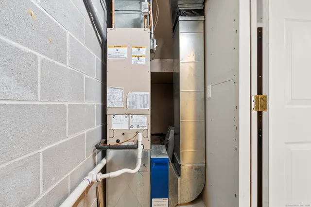 a bathroom with a tub and shower