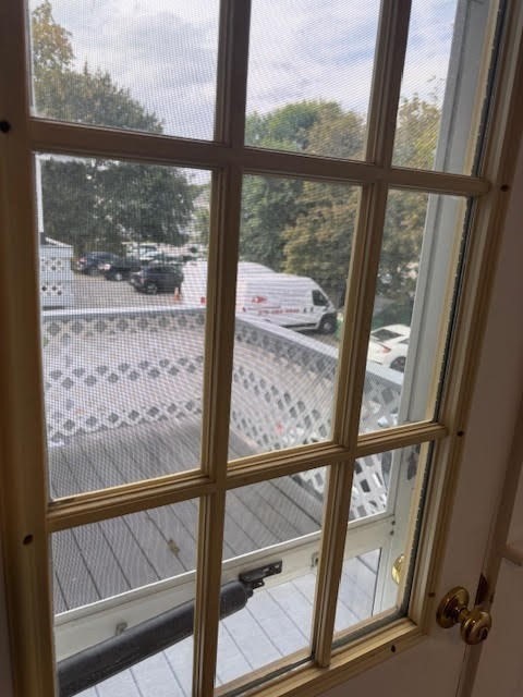 1 Windsor Avenue, Unit 1 Acton, MA 01720 - Photo 7 of 14 a view of a glass door with a from a window