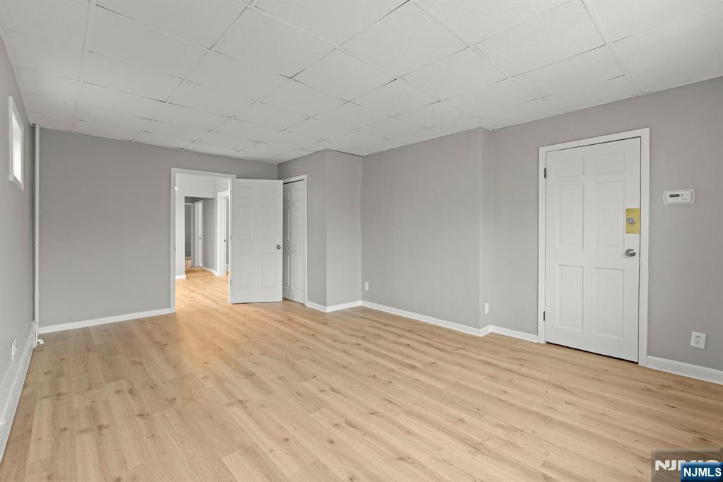 736 2nd Street, Unit 1 Secaucus, NJ 07094 - Photo 7 of 21 a view of empty room with wooden floor