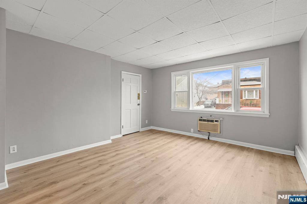 736 2nd Street, Unit 1 Secaucus, NJ 07094 - Photo 8 of 21 an empty room with windows