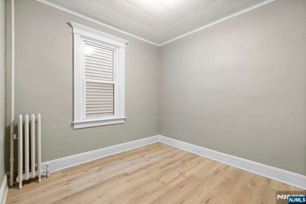 736 2nd Street, Unit 1 Secaucus, NJ 07094 - Photo 9 of 21 an empty room with a window