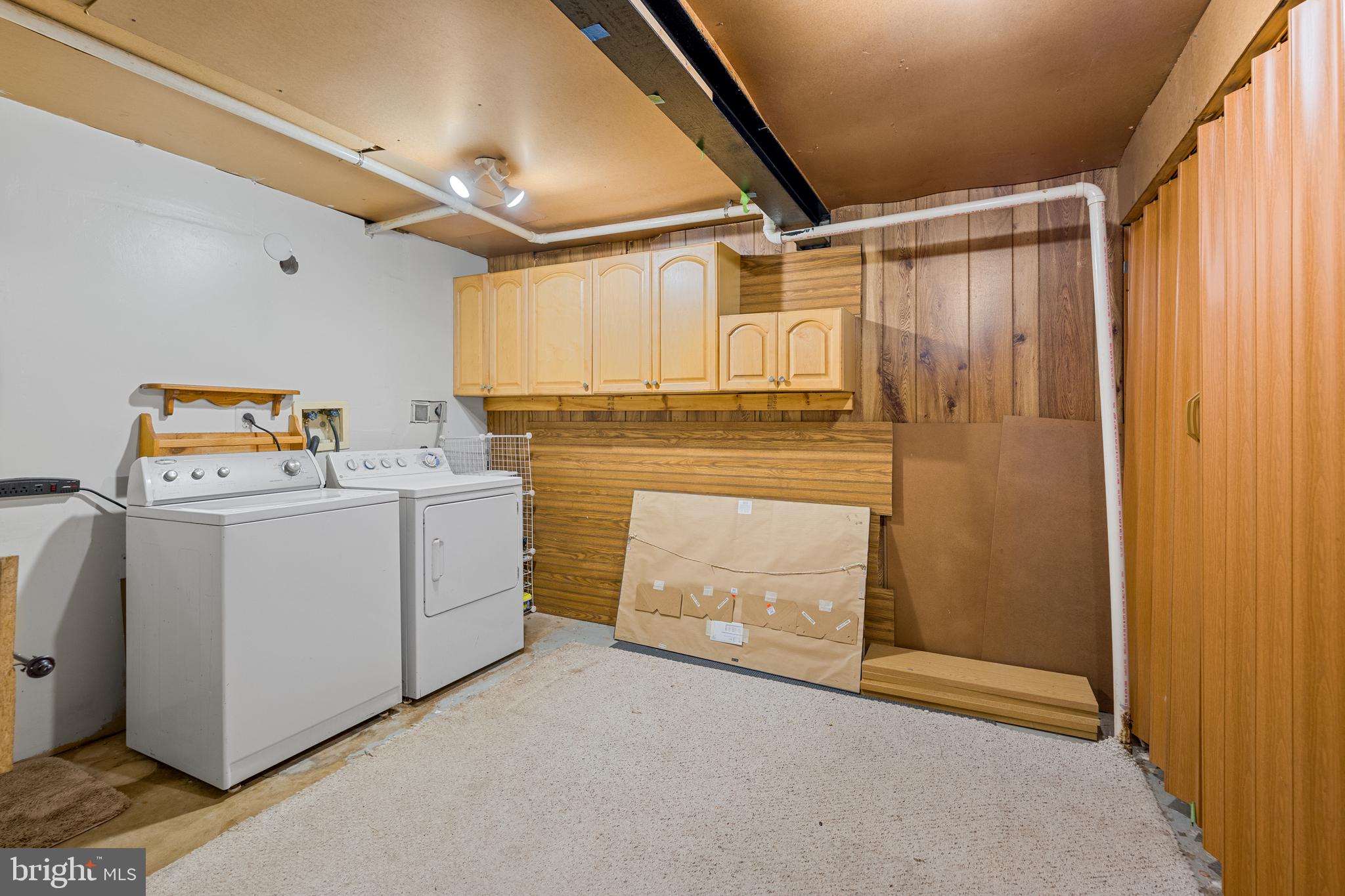 2829 Grovemore Lane Vienna, VA 22180 - Photo 10 of 42 Versatile laundry space with storage.