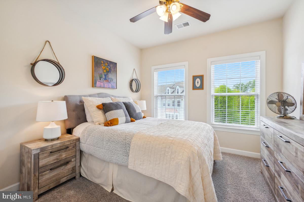 4091 River Forth Drive Fairfax, VA 22030 - Photo 15 of 32 a bedroom with a large bed and a window