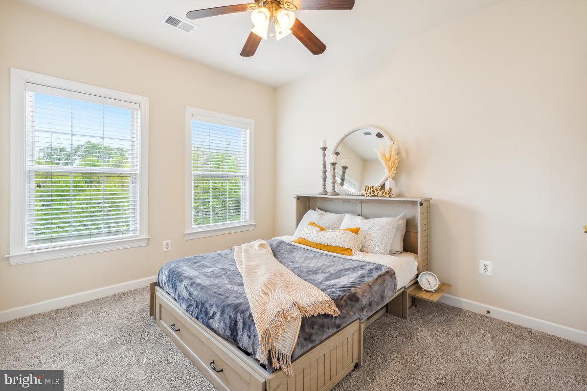 4091 River Forth Drive Fairfax, VA 22030 - Photo 17 of 32 a bedroom with a bed and a window
