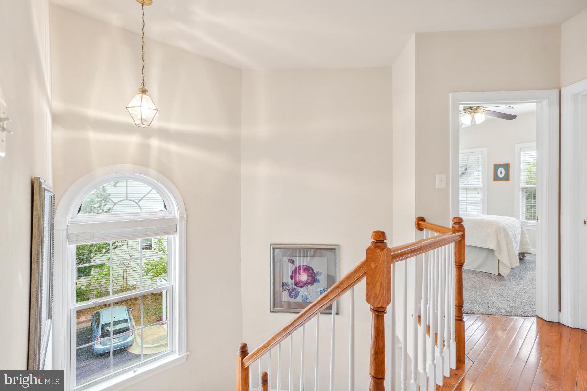 4091 River Forth Drive Fairfax, VA 22030 - Photo 21 of 32 a view of an entryway with wooden floor