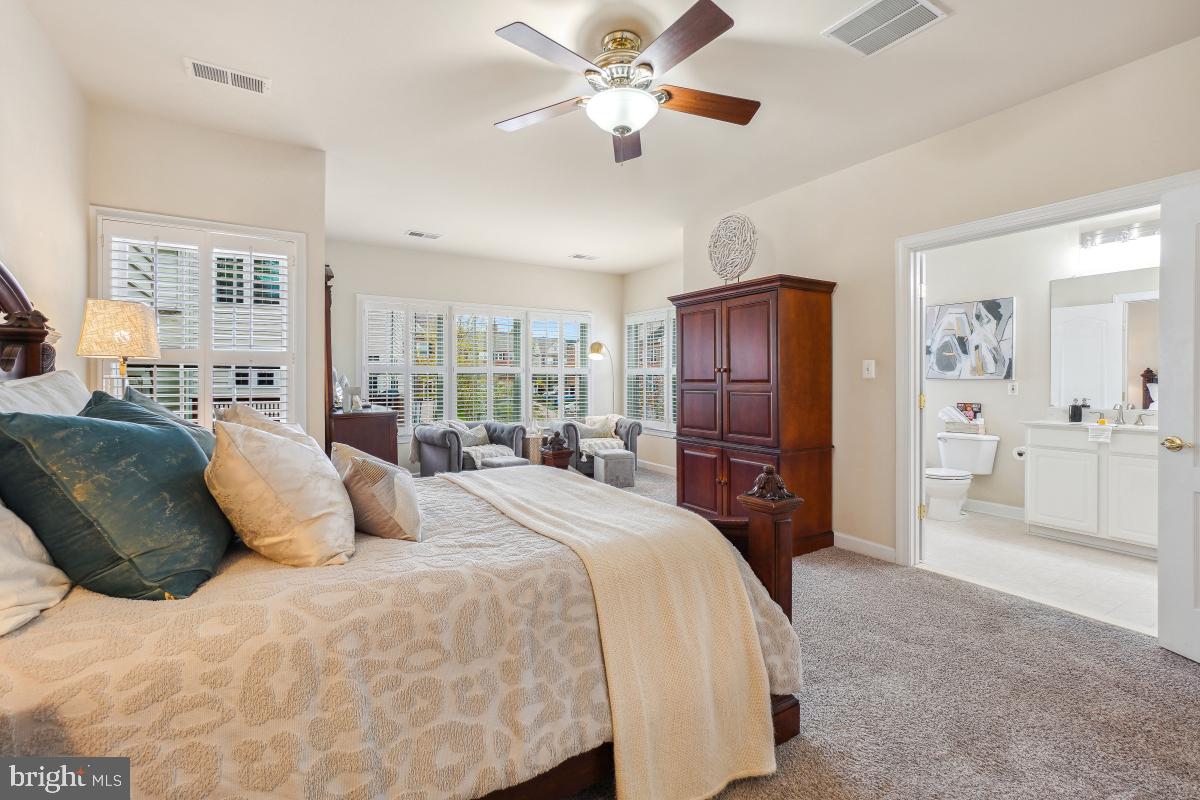 4091 River Forth Drive Fairfax, VA 22030 - Photo 23 of 32 a bedroom with a bed and a television