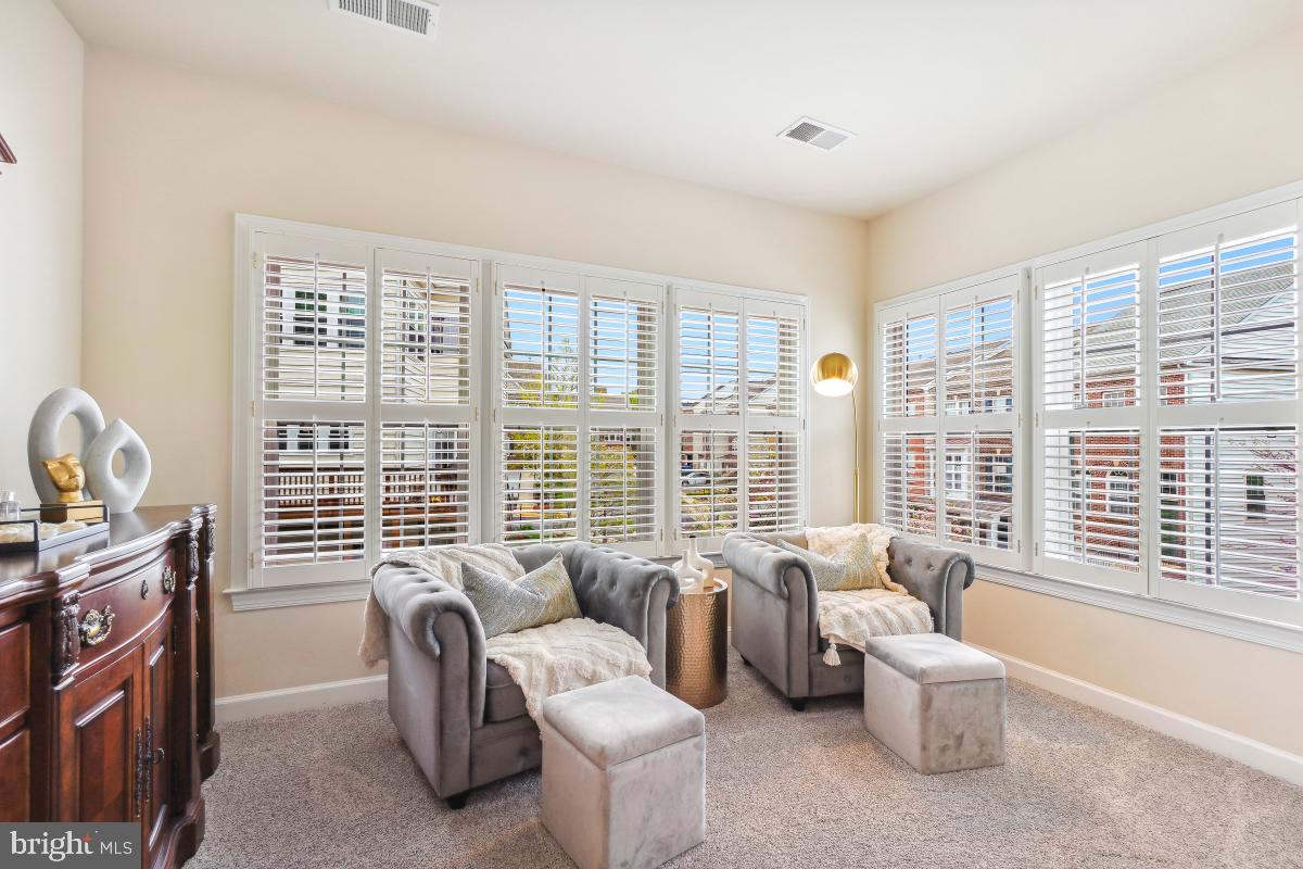 4091 River Forth Drive Fairfax, VA 22030 - Photo 25 of 32 a living room with furniture and windows