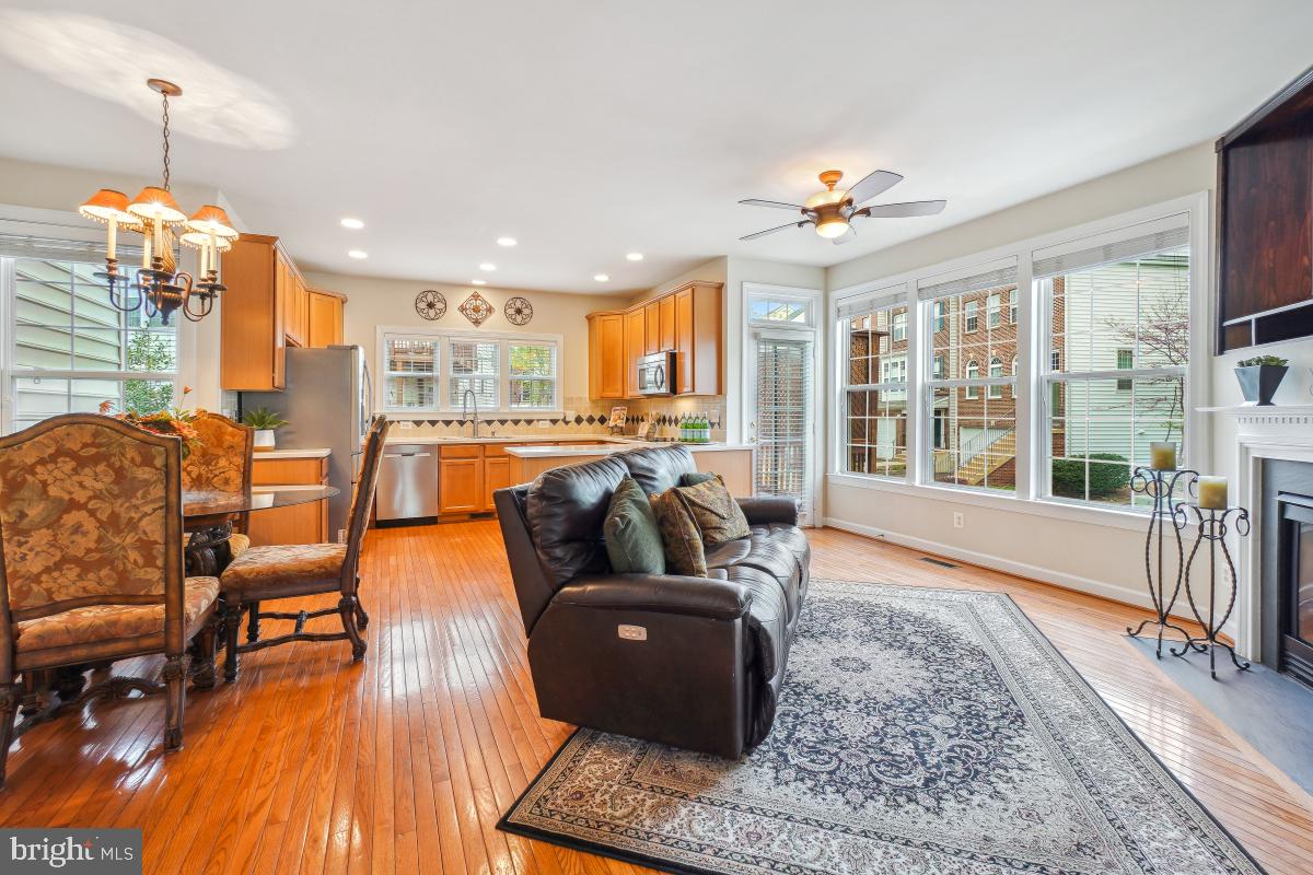 4091 River Forth Drive Fairfax, VA 22030 - Photo 7 of 32 a living room with furniture and a chandelier
