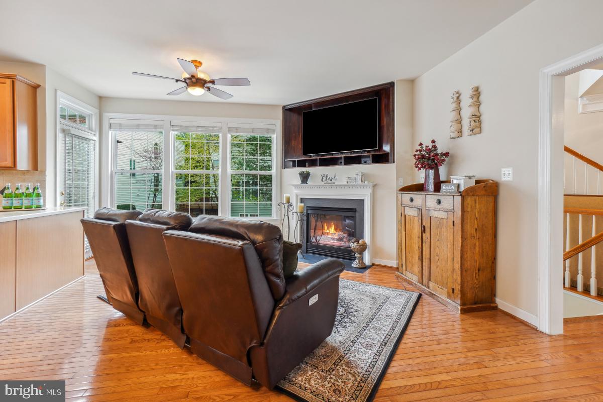 4091 River Forth Drive Fairfax, VA 22030 - Photo 9 of 32 a living room with furniture fireplace and flat screen tv
