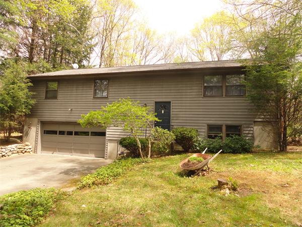 115 Leverett Road Amherst, MA 01002 - Photo 1 of 15 a backyard of a house with yard and outdoor seating