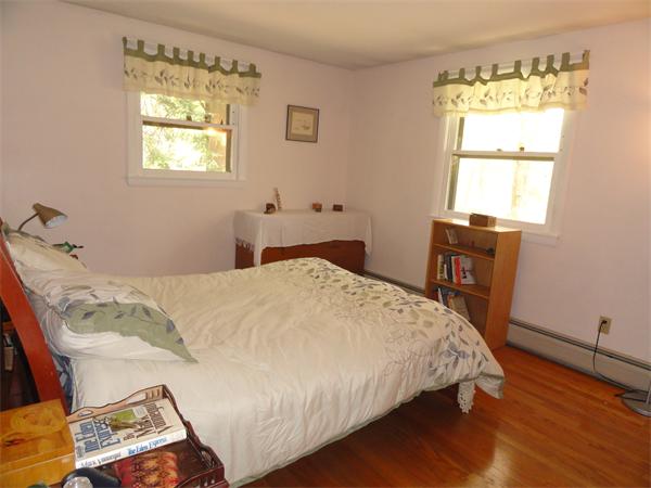 115 Leverett Road Amherst, MA 01002 - Photo 11 of 15 a bedroom with a bed and a window