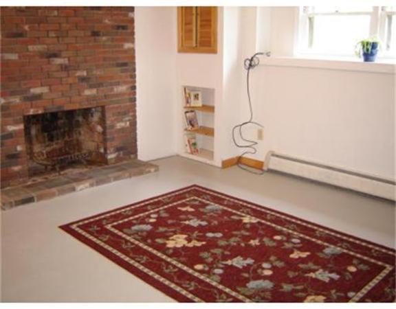 115 Leverett Road Amherst, MA 01002 - Photo 13 of 15 a view of a fireplace in a room