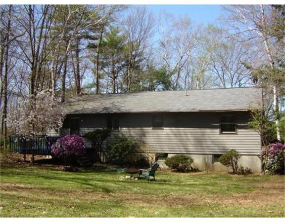 115 Leverett Road Amherst, MA 01002 - Photo 15 of 15 a front view of a house with a garden