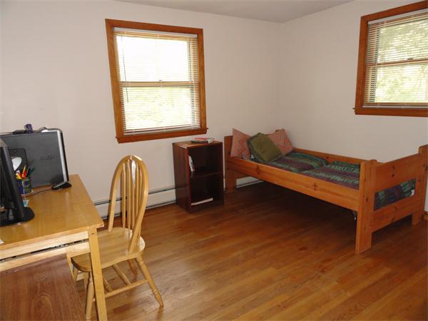 115 Leverett Road Amherst, MA 01002 - Photo 10 of 15 a bedroom with a bed and a window