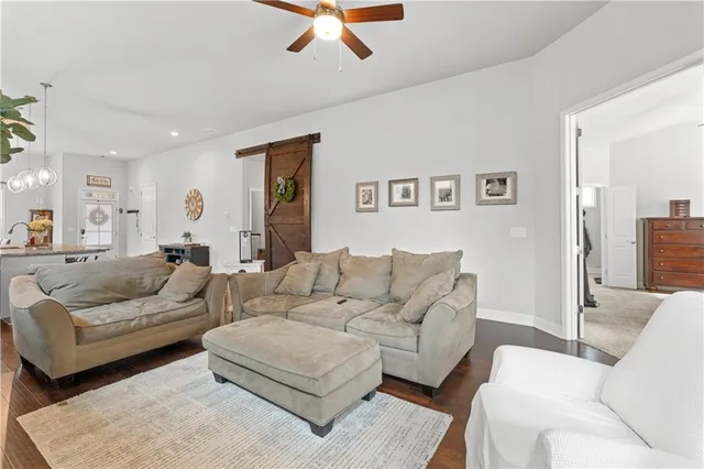a living room with furniture and a couch