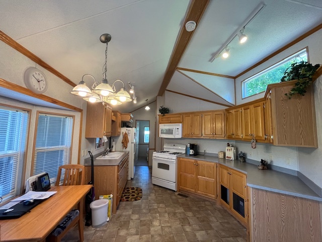 2795 East 28th Road Marseilles, IL 61341 - Photo 8 of 65 a kitchen with cabinets a sink and appliances