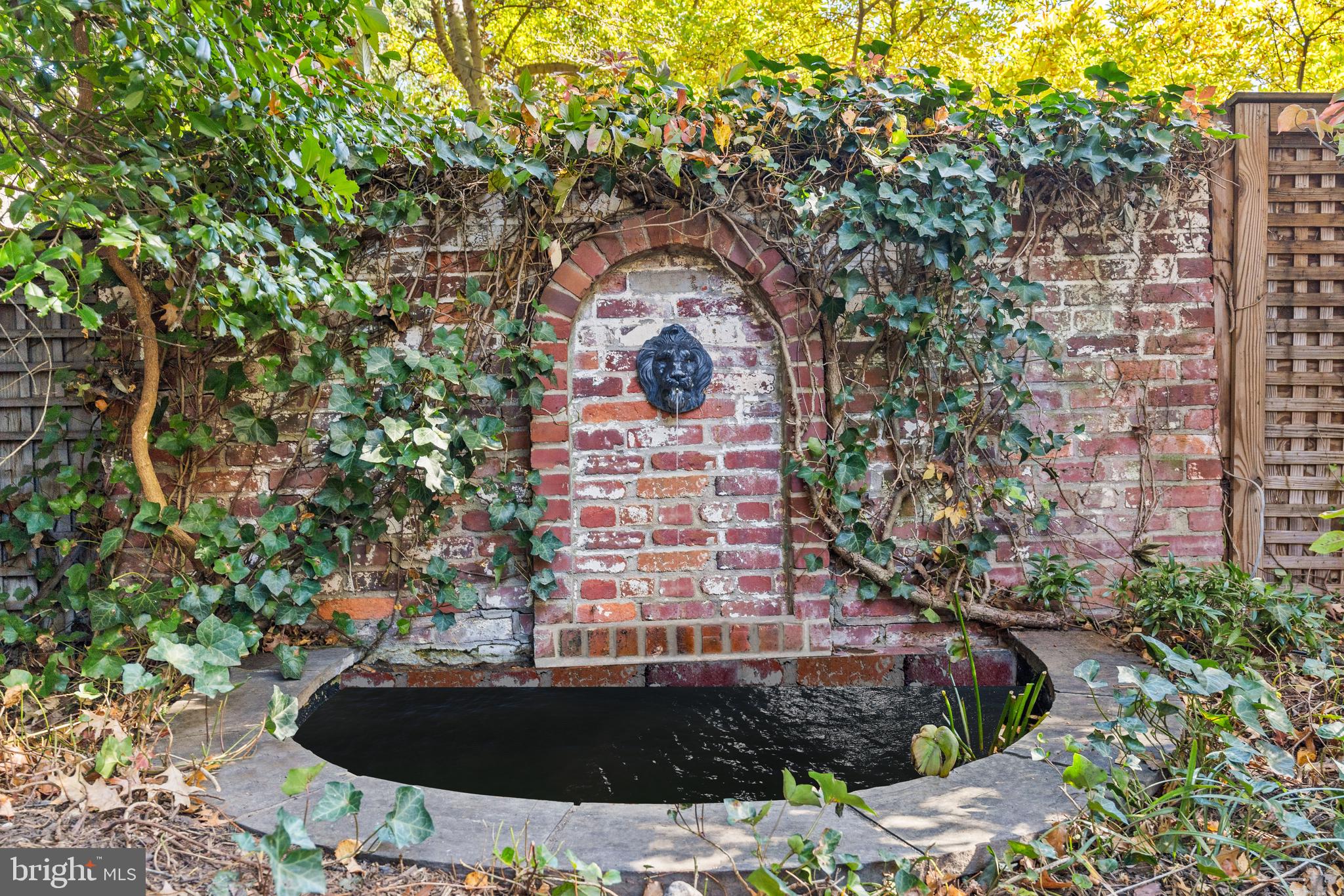 1409 31st Street Northwest Washington, DC 20007 - Photo 5 of 8 a view of building with yard