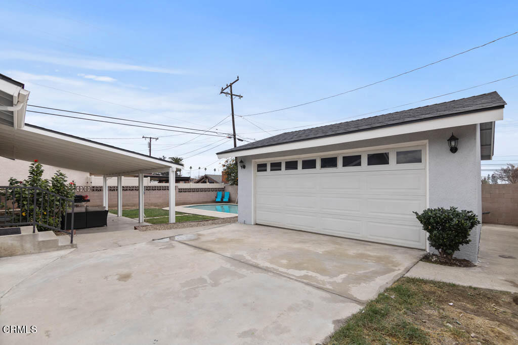 9195 Harvard Street Rancho Cucamonga, CA 91730 - Photo 29 of 37 a view of a house with a porch