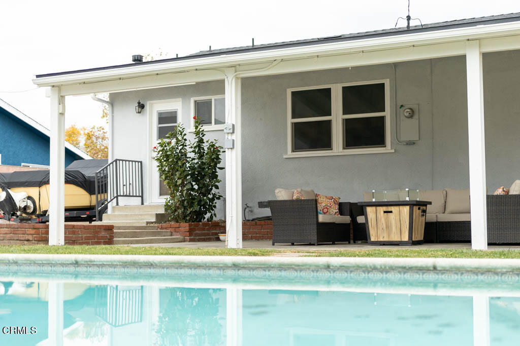 9195 Harvard Street Rancho Cucamonga, CA 91730 - Photo 30 of 37 a view of pool with outdoor seating