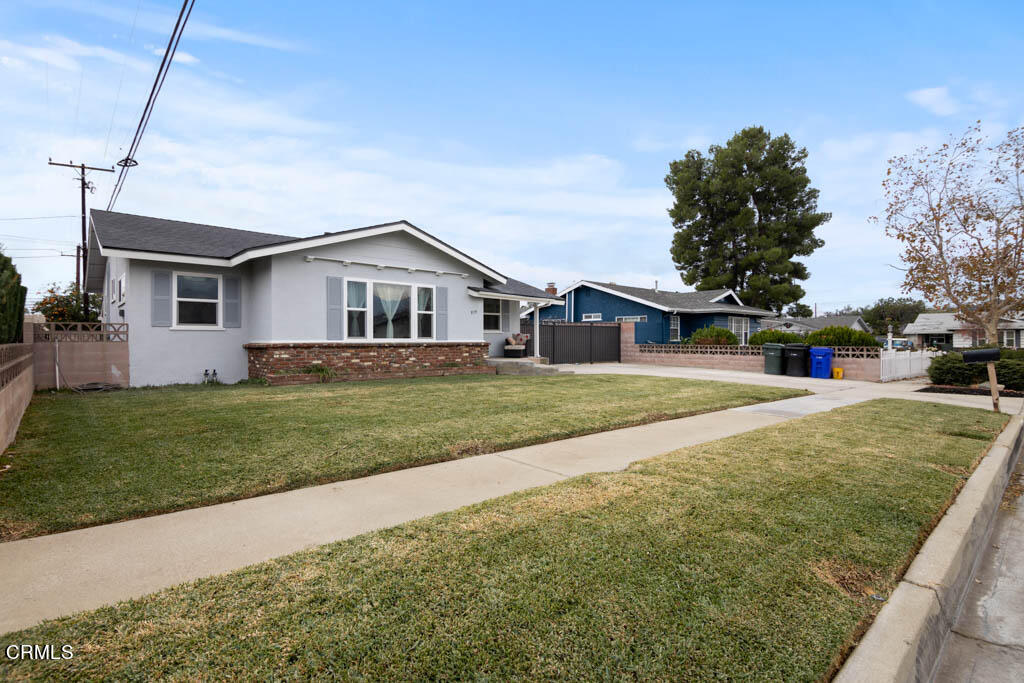 9195 Harvard Street Rancho Cucamonga, CA 91730 - Photo 3 of 37 a front view of house with yard and green space