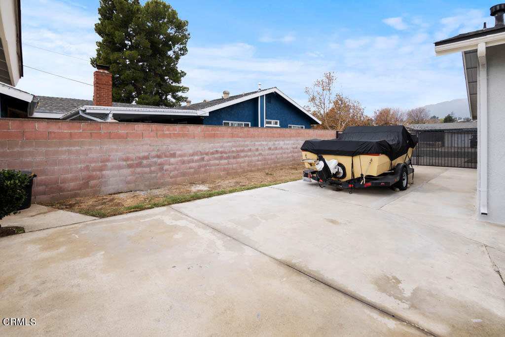 9195 Harvard Street Rancho Cucamonga, CA 91730 - Photo 34 of 37 a car parked on the side of the road