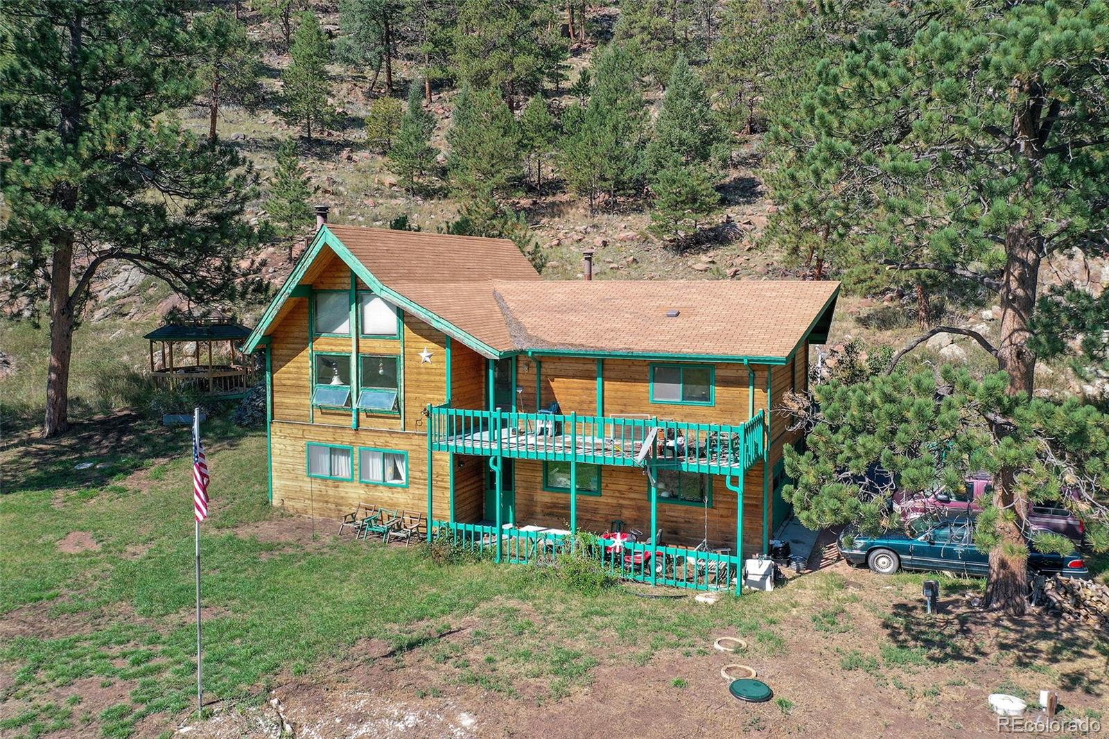 79 Ranch View Drive Florissant, CO 80816 - Photo 16 of 40 a view of a house with a yard and sitting area