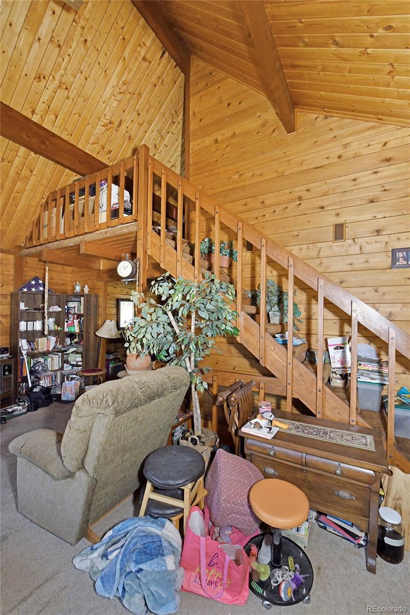 79 Ranch View Drive Florissant, CO 80816 - Photo 32 of 40 a view of a chairs and table in the balcony