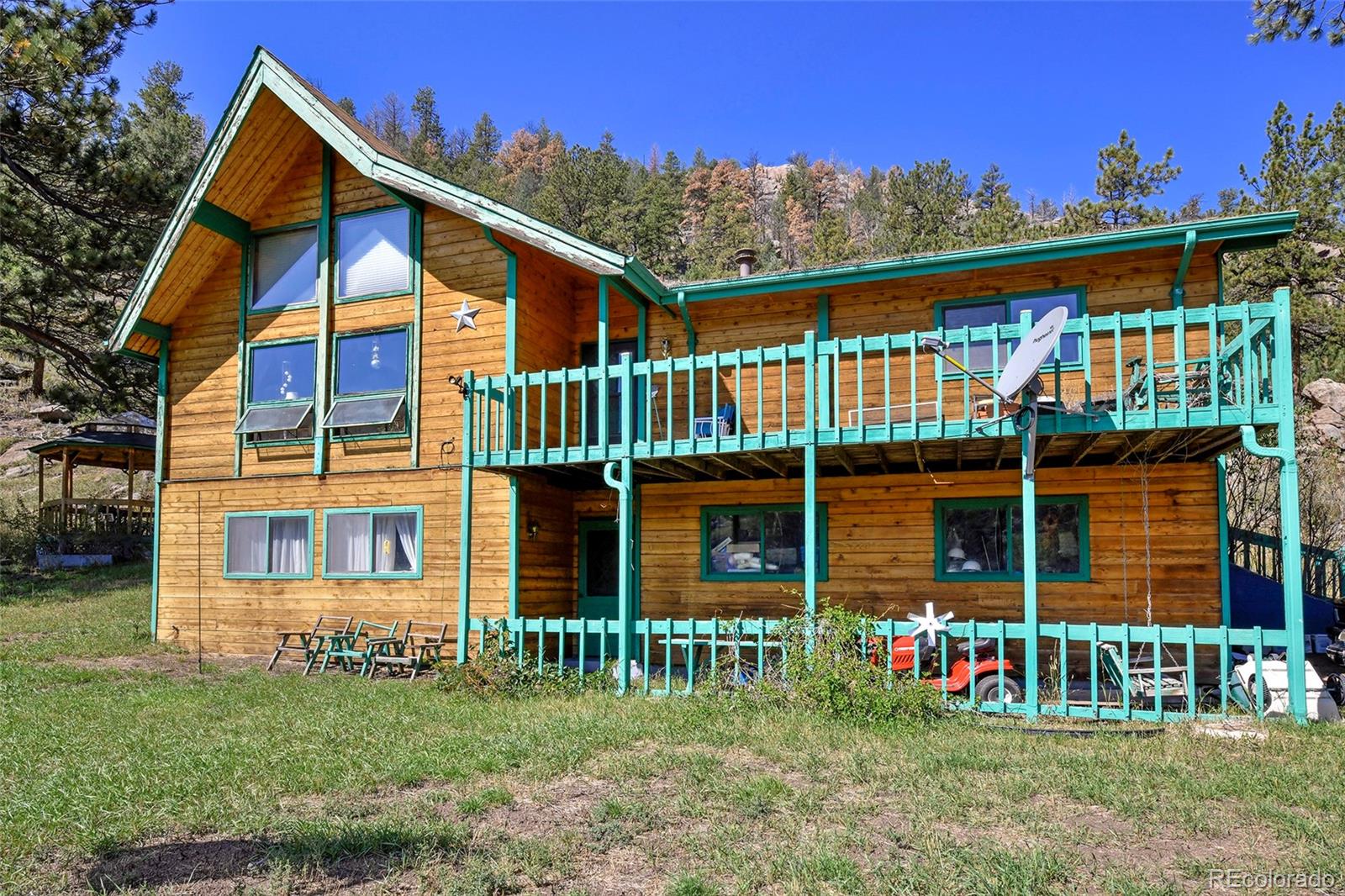 79 Ranch View Drive Florissant, CO 80816 - Photo 6 of 40 front view of house with a yard
