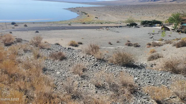 a view of a road with mountains in the background