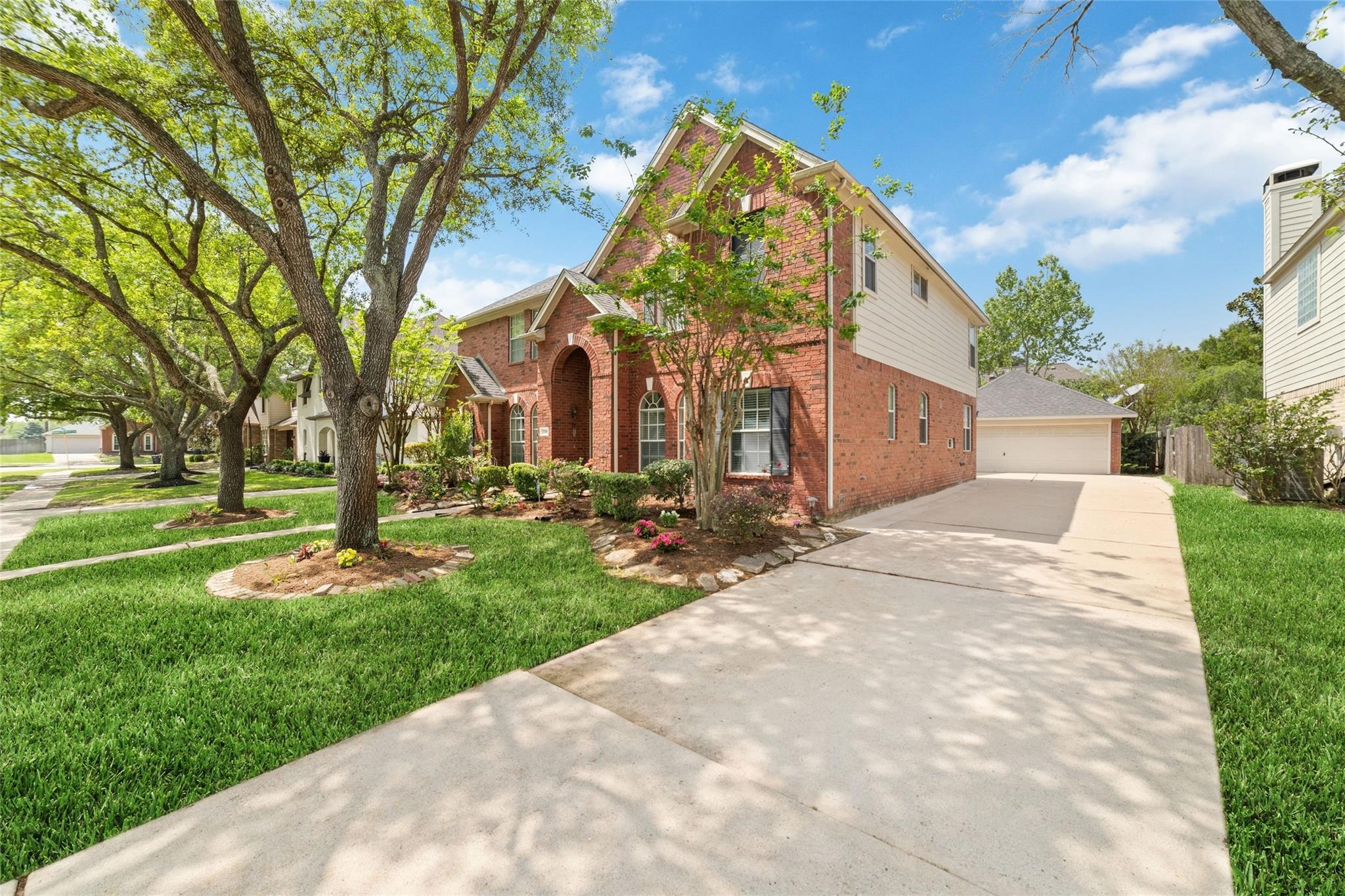22406 Piper Terrace Lane Katy, TX 77450 - Photo 3 of 44 a view of a building with a yard