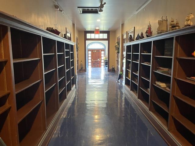 5093 Vera Cruz Road North Emmaus, PA 18049 - Photo 30 of 47 A long corridor with extensive built-in shelving offers ample display and storage opportunities.
