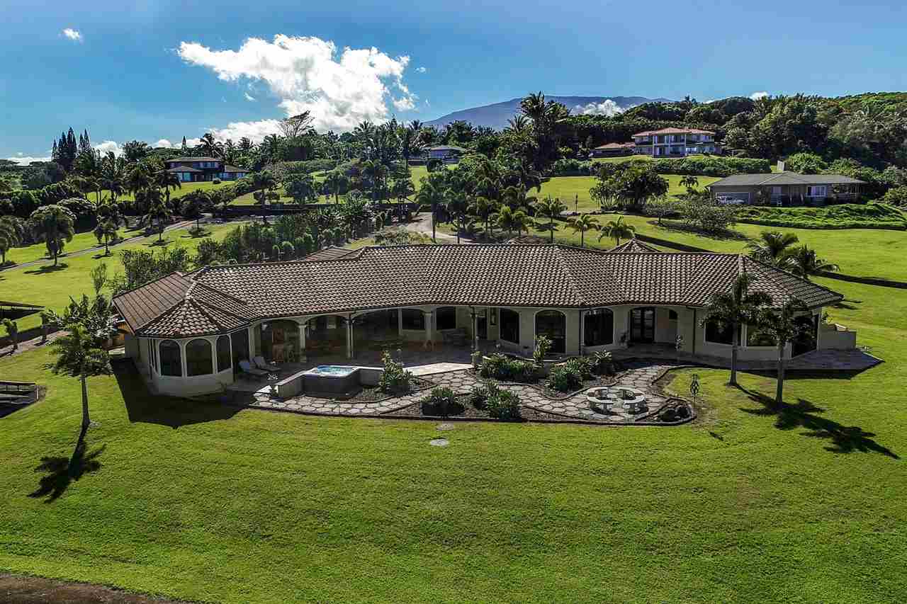80 Hale Pili Way Haiku, HI 96708 - Photo 2 of 30 a front view of a house with garden