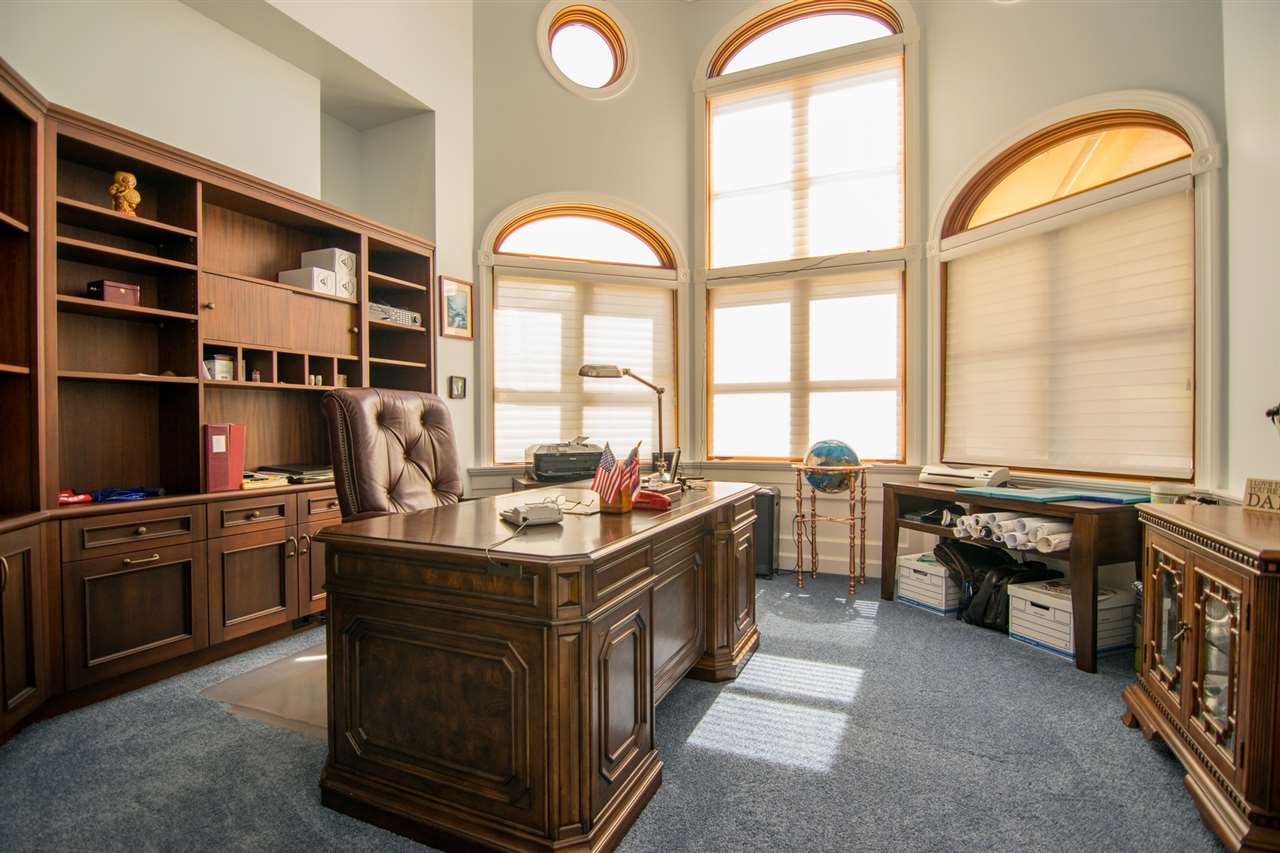 80 Hale Pili Way Haiku, HI 96708 - Photo 28 of 30 a kitchen with a sink stove and cabinets