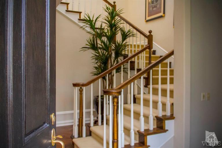 2238 Canyonback Road Los Angeles, CA 90049 - Photo 4 of 43 a view of entryway with wooden floor and door