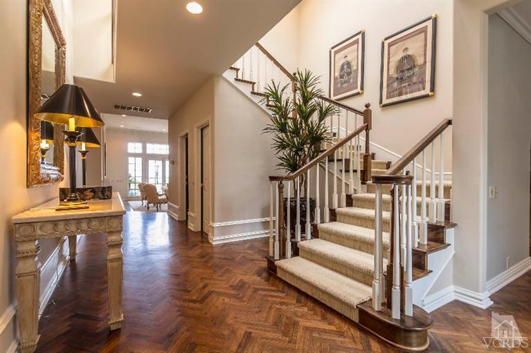 2238 Canyonback Road Los Angeles, CA 90049 - Photo 5 of 43 a view of entryway and hall with wooden floor