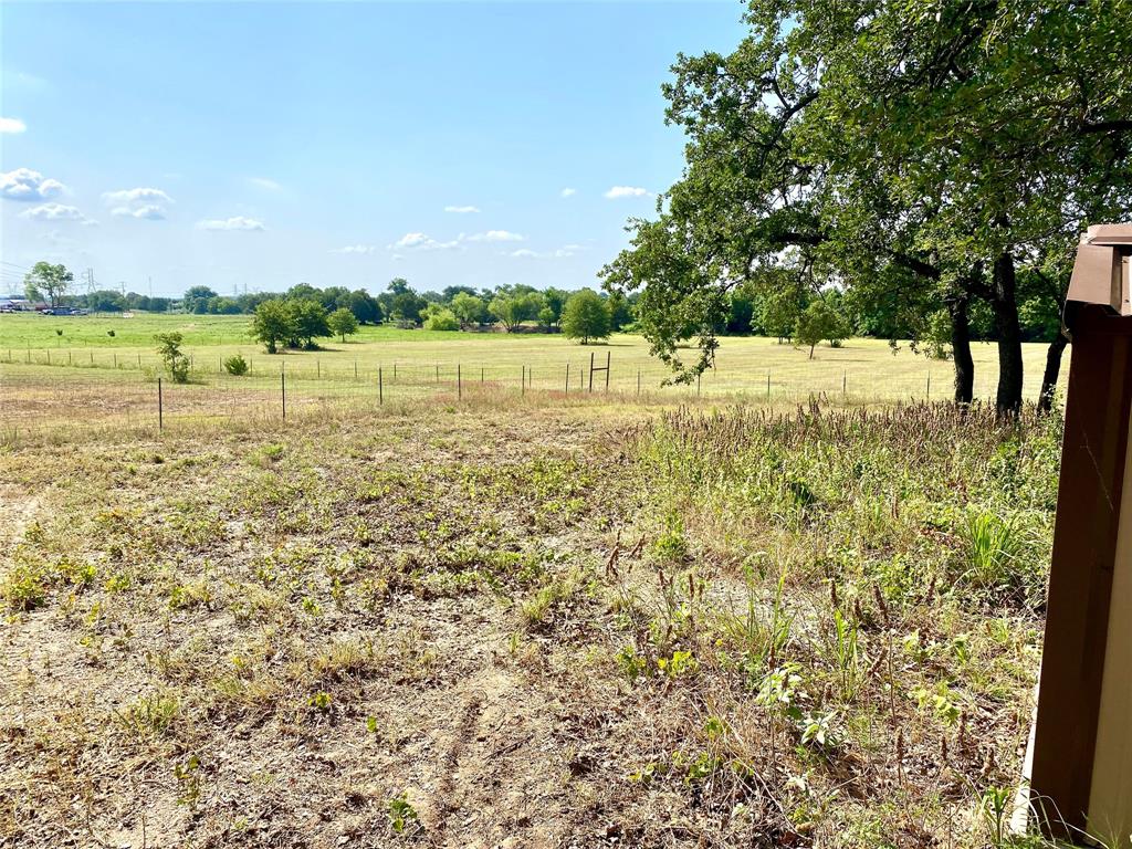 524 County Road 1792 Sunset, TX 76270 - Photo 17 of 40 a view of a lake with houses in the background