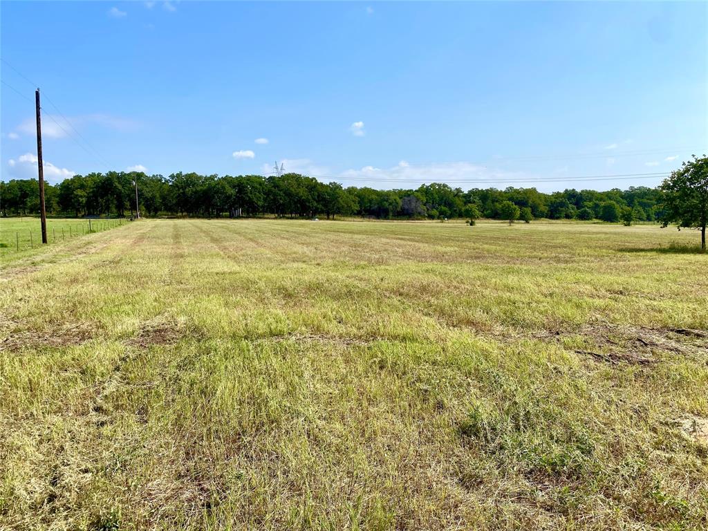 524 County Road 1792 Sunset, TX 76270 - Photo 23 of 40 a view of lake with mountain in background