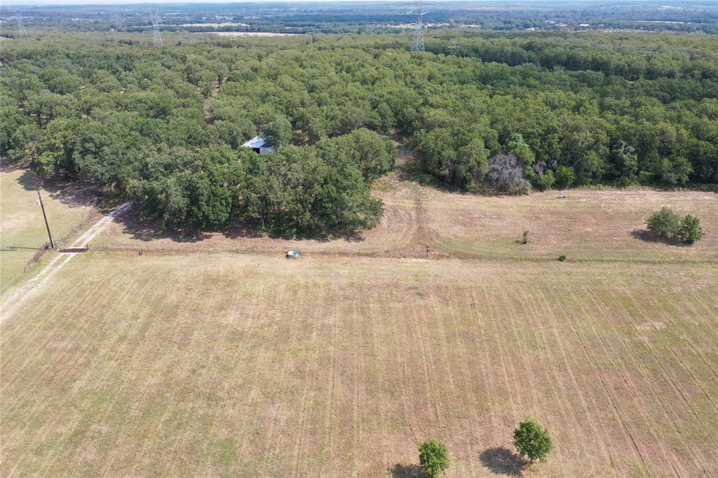 524 County Road 1792 Sunset, TX 76270 - Photo 33 of 40 a view of a dry yard with trees