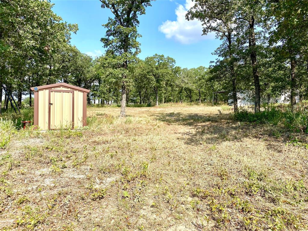 524 County Road 1792 Sunset, TX 76270 - Photo 6 of 40 a view of a house with a yard