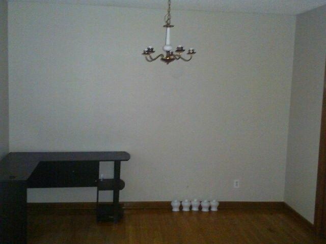 4909 Neely Road Memphis, TN 38109 - Photo 5 of 20 a view of a room with wooden floor and fan