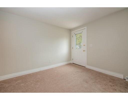 97 Burnham Road Lowell, MA 01852 - Photo 6 of 14 a view of an empty room and closet area