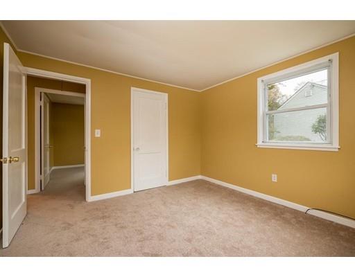 97 Burnham Road Lowell, MA 01852 - Photo 9 of 14 a view of an empty room with a window
