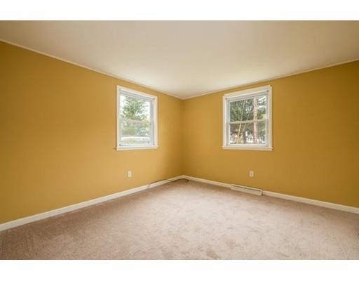 97 Burnham Road Lowell, MA 01852 - Photo 10 of 14 a view of an empty room with a window