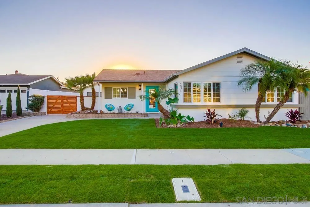 4534 Kamloop Avenue San Diego, CA 92117 - Photo 1 of 36 a front view of house with yard and green space