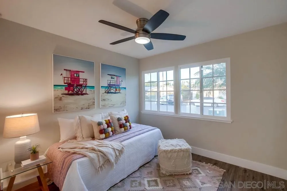 4534 Kamloop Avenue San Diego, CA 92117 - Photo 20 of 36 a bedroom with furniture and a window