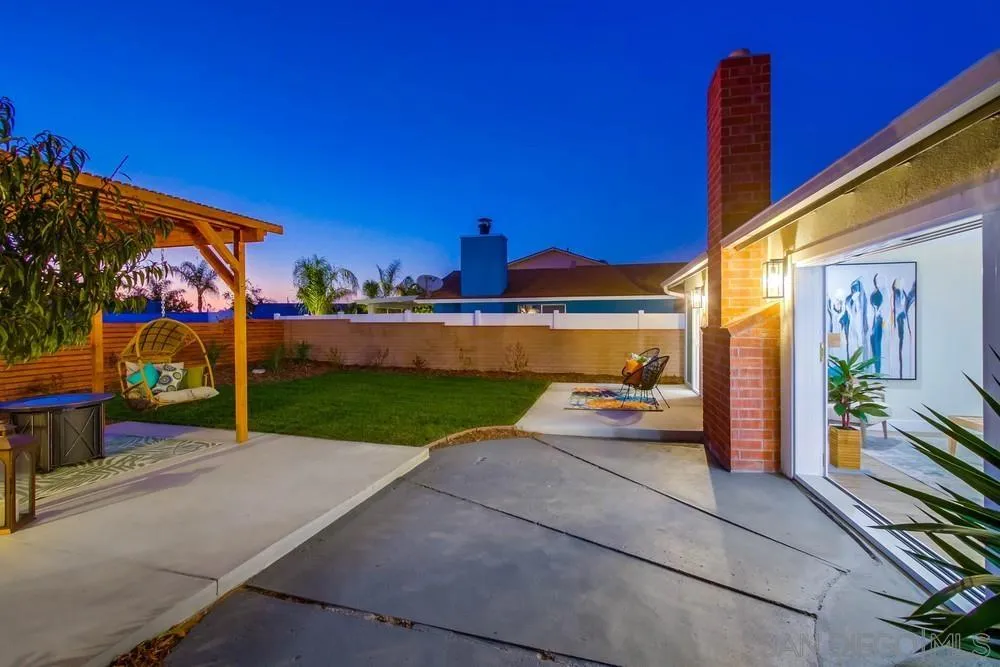 4534 Kamloop Avenue San Diego, CA 92117 - Photo 5 of 36 a view of a street with couches and potted plants